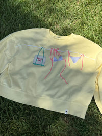 Coastal Clothesline Sweatshirt on Buttercream Yellow