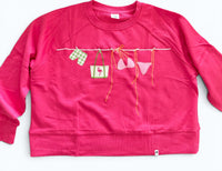 Coastal 🦩 Clothesline Sweatshirt on Watermelon