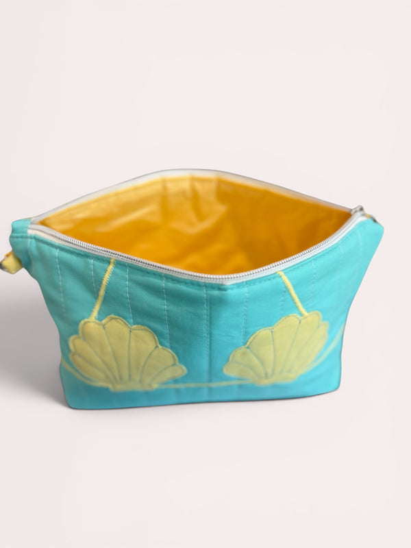 Butter Yellow Clam Shell Bikini Bag on Aqua