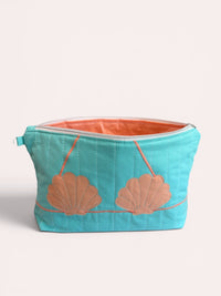 Apricot Clam Shell Bikini Bag on Aqua