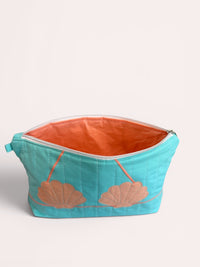 Apricot Clam Shell Bikini Bag on Aqua
