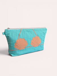 Apricot Clam Shell Bikini Bag on Aqua